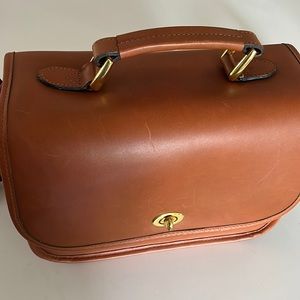 Ona Brown leather bag suitable for camera equipment.